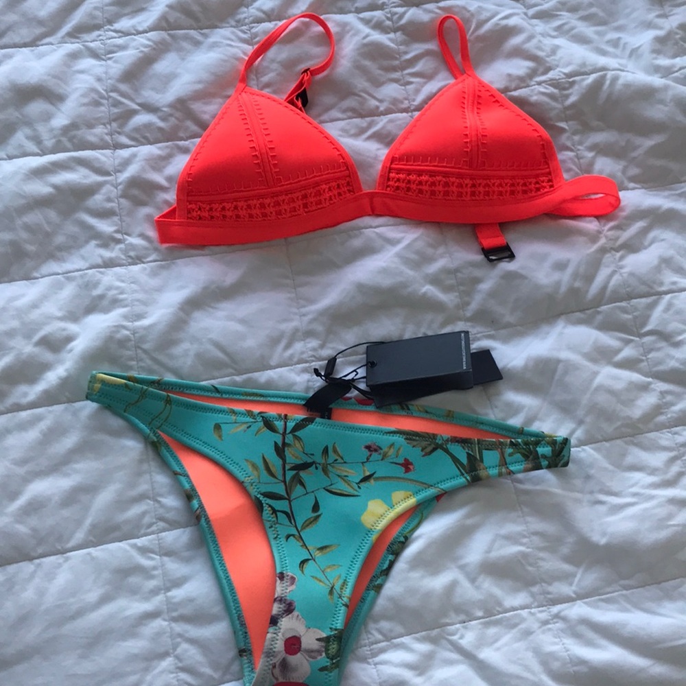 Triangl two piece with coral top and floral bottom